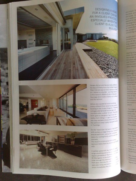 Magazine pages showing the interior living spaces and deck of the hillside residence